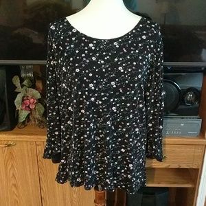 Black tunic with white, pink, blush flowers.